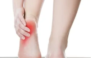 Pain highlighted under the heel where the plantar fascia attaches